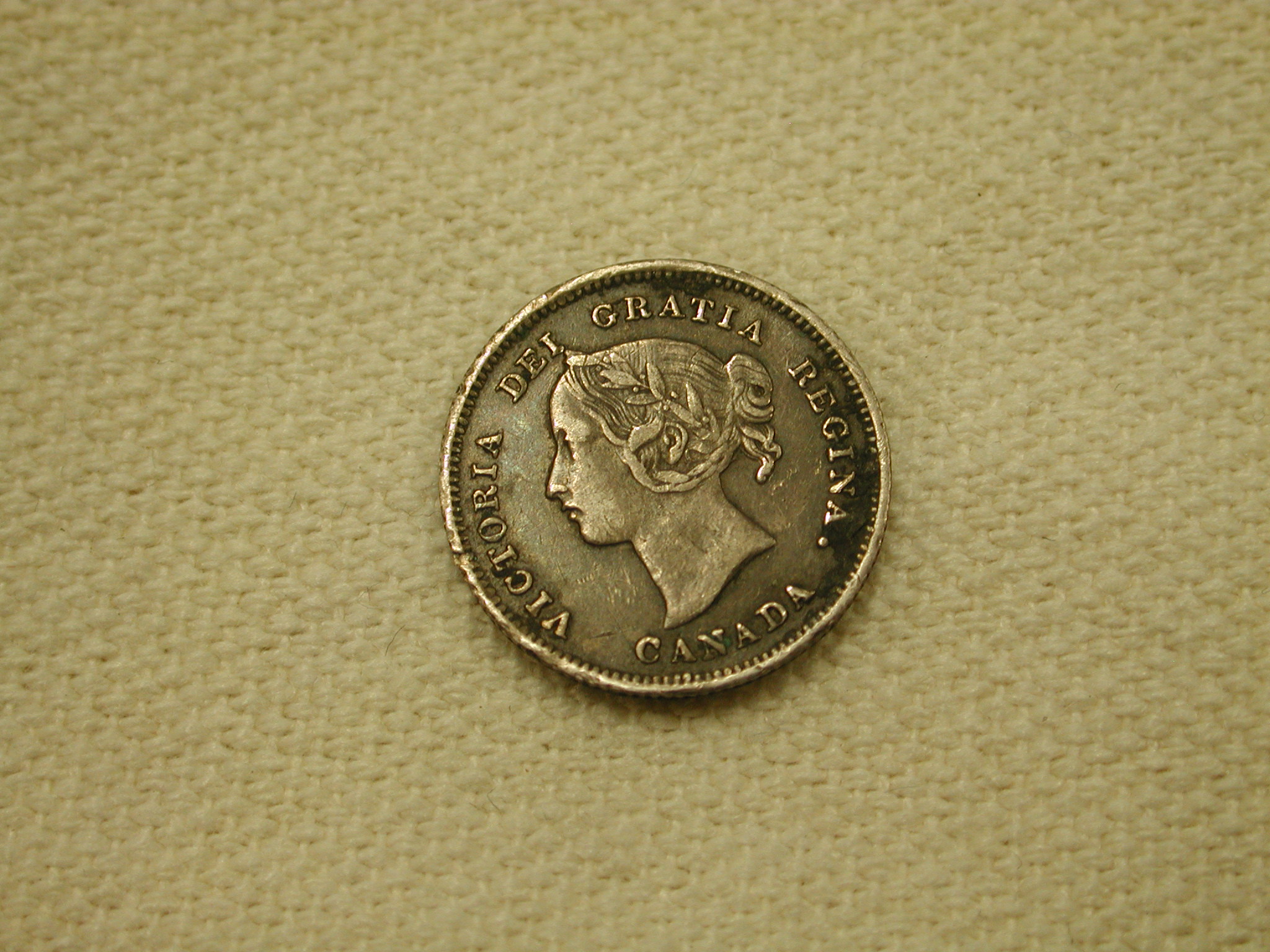 1900 Canada 5 Cent Round "O"s Extra Fine +