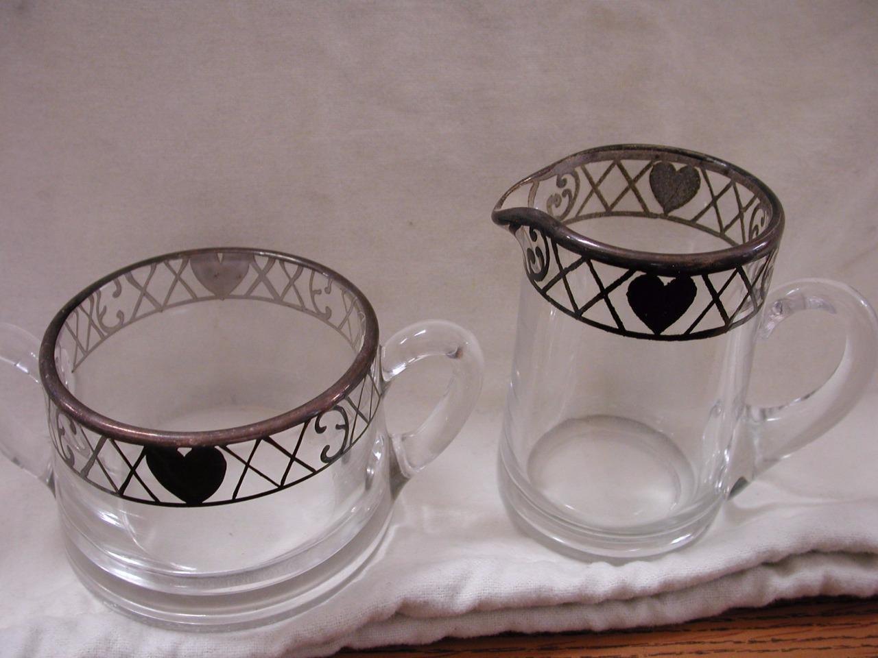 Heisey silver overlay sugar and creamer with painted hearts on rim sweet!