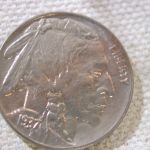 1937-D U.S Five Cent Buffalo Nickel UNC golden toning