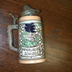 Heidelberg Schloss Castle men relaxing crossed arrows logo 6 3/4″ high with Lid