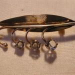 .830 Silver Leaf brooch with three white spinels 2 inches long gold washed