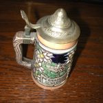 Heidelberg Schloss Castle men relaxing crossed arrows logo 6 3/4″ high with Lid