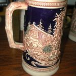 GERZ floral Navy Ecru set of 2 8 1/2″ tall Gute Waid /Jagers Freud -Muchen