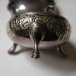 Sterling floral repousse milgrain rim beeded 3 legs goldwash salt cellar no mono