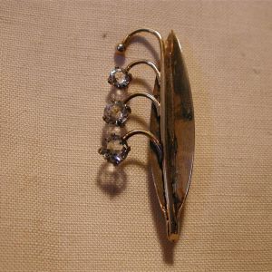 .830 Silver Leaf brooch with three white spinels 2 inches long gold washed
