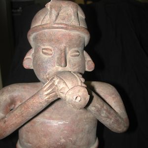 Pre-Columbian 17 inch tall kneeling Male Colima Terracotta blowing horn shell