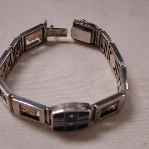 Ray Tracey Knifewing Segura 14KT and Sterling inlaid 7" window motif bracelet