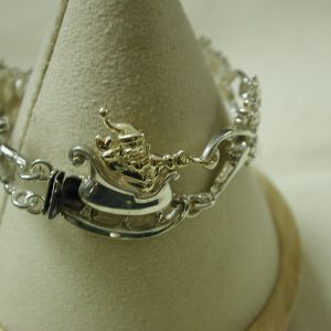 Vintage Sterling and 14KT Santa with Reindeer bracelet 7"