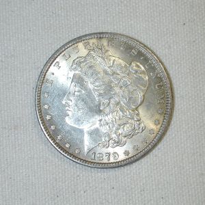 1879- U.S Morgan Silver Dollar UNC golden toning