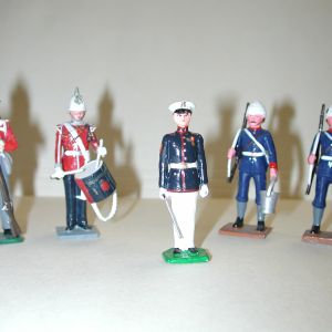 Set of 5 toy metal soldiers- with drum-rifles-swords- Made in England- Marx- 2 1/4 inches tall