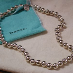 Tiffany and Co. Sterling .925 10mm beads 18 inches w T charm and pouch
