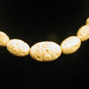 Vintage Celluloid Carved Circles 14" graduated 6mm - 14mm elongated Oval Cream