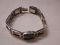 Ray Tracey Knifewing Segura 14KT and Sterling inlaid 7" window motif bracelet