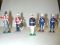 Set of 5 toy metal soldiers- with drum-rifles-swords- Made in England- Marx- 2 1/4 inches tall