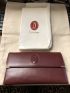 Cartier Paris Burgandy Never used Vintage wallet portfolio clutch 4.5 x 8 multi purpose